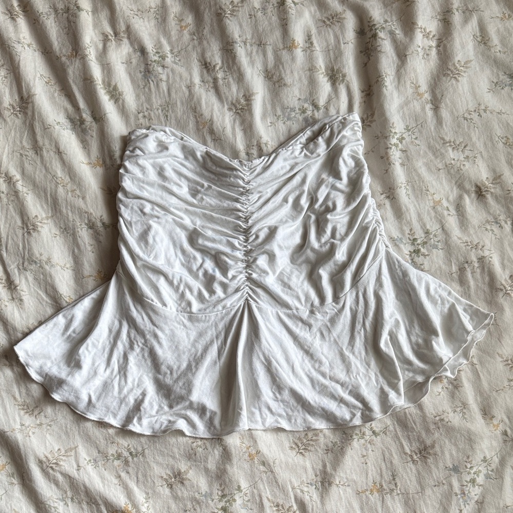White ruched mini skirt with built in shorts size small in great condition